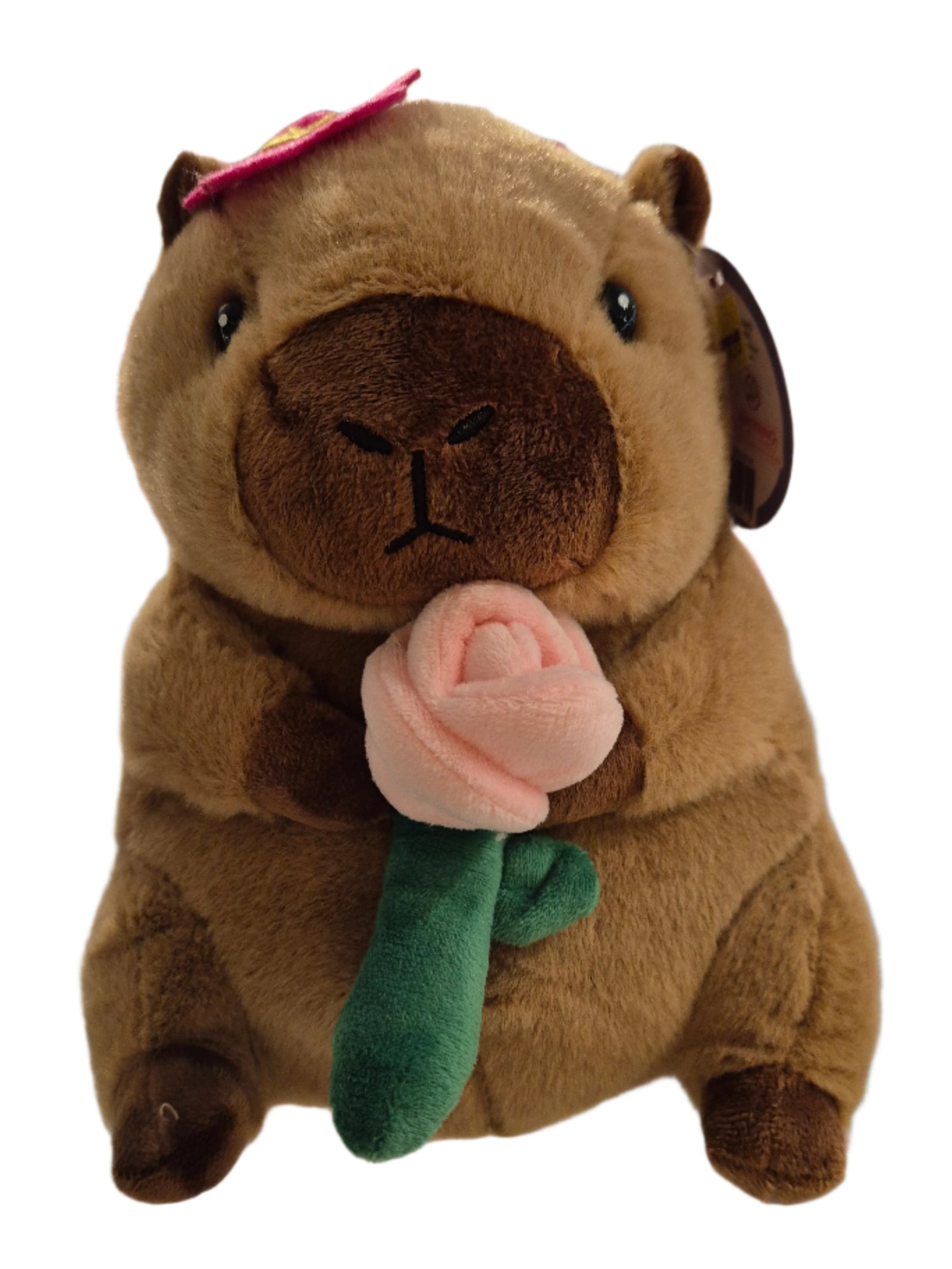 Plush toy hippo in a store setting with blurred background