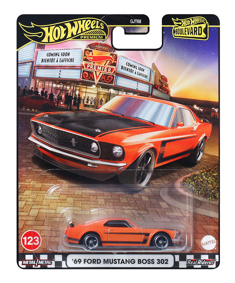 A packaged Hot Wheels toy car model representing a red '69 Ford Mustang Boss 302 with a display card showing the car details and the Hot Wheels branding.