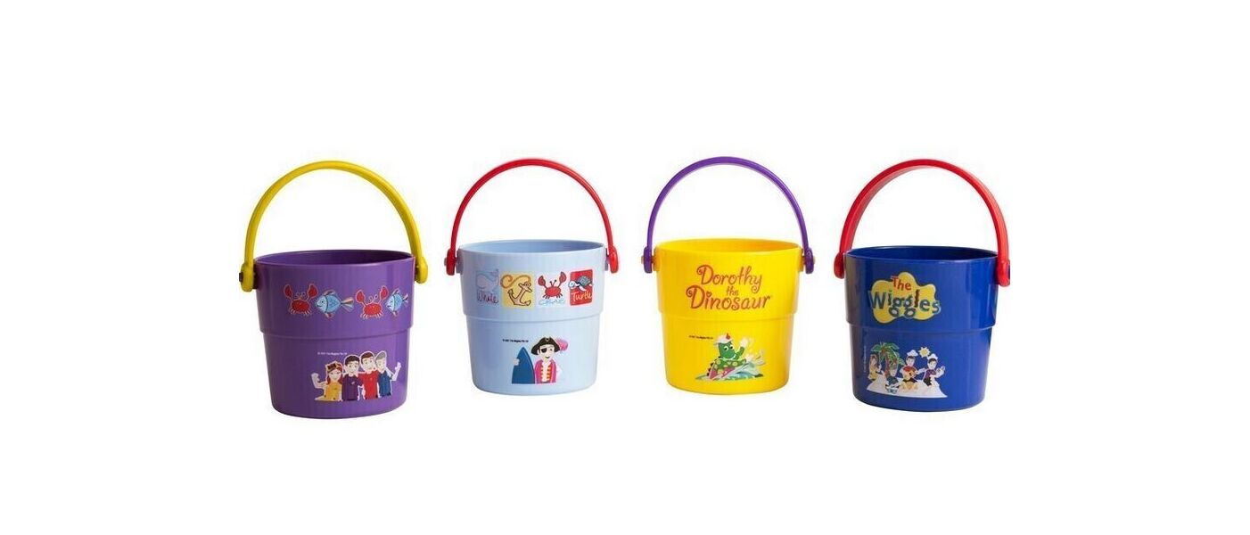 Four colorful sand buckets with Wiggles characters