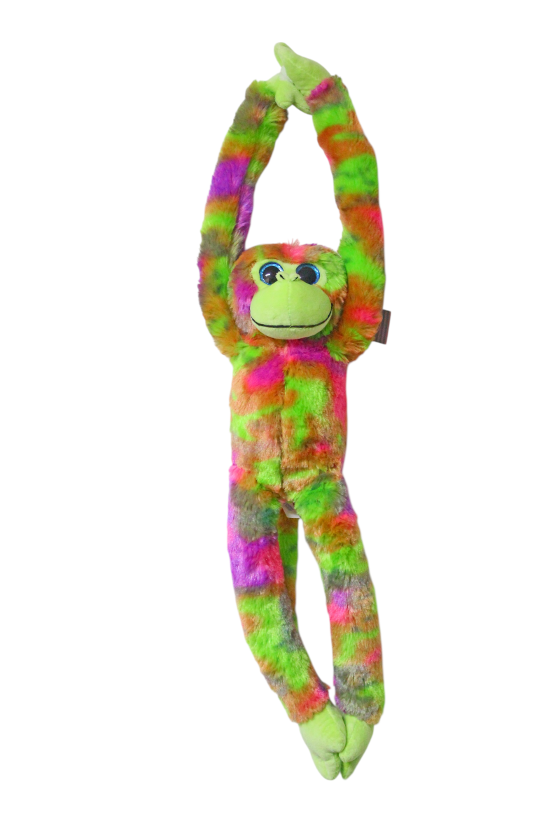 A colorful tie-dye plush monkey toy with bright green, pink, orange, and purple patterns, featuring a light green face and hands, posed with its arms raised against a plain white background.